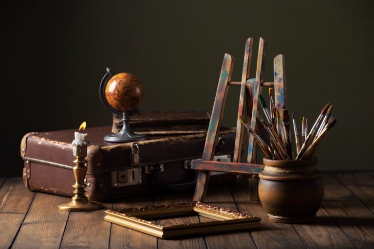 view-vintage-paint-brushes-easel Large